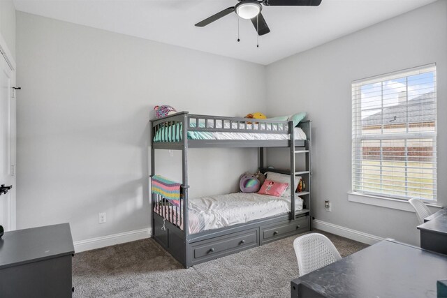 bedroom featuring baseboards, carpet floors, and ceiling fan