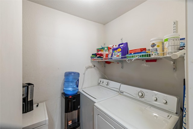 clothes washing area with laundry area and separate washer and dryer