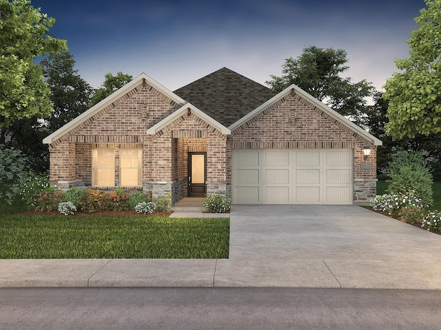 view of front facade with driveway, roof with shingles, a garage, stone siding, and brick siding