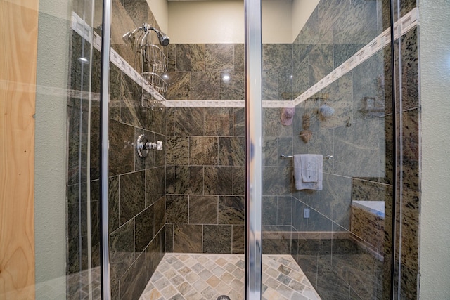 full bathroom with a shower stall