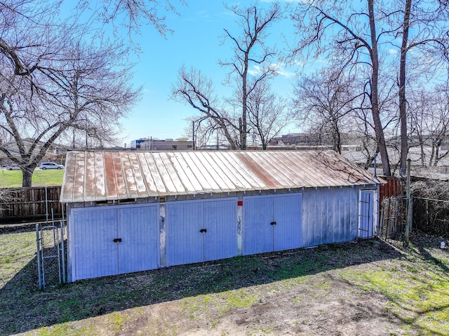 garage with fence