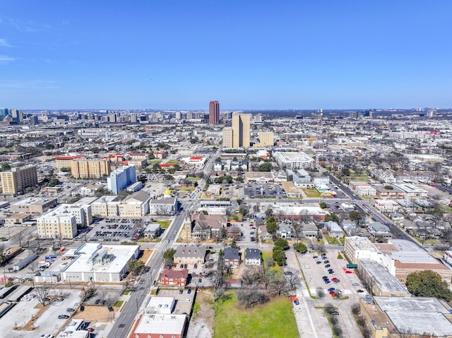 birds eye view of property featuring a view of city