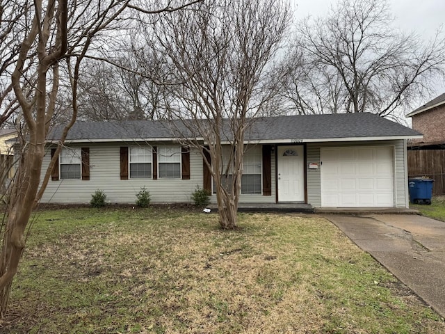 single story home featuring a front yard, fence, roof with shingles, an attached garage, and concrete driveway