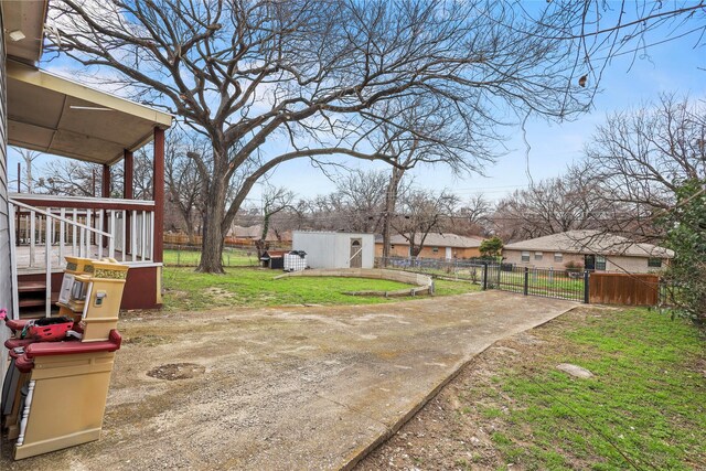 5621 Rocky Ridge Rd, Dallas, TX 75241 - view of yard with a gate, an outdoor structure, and fence