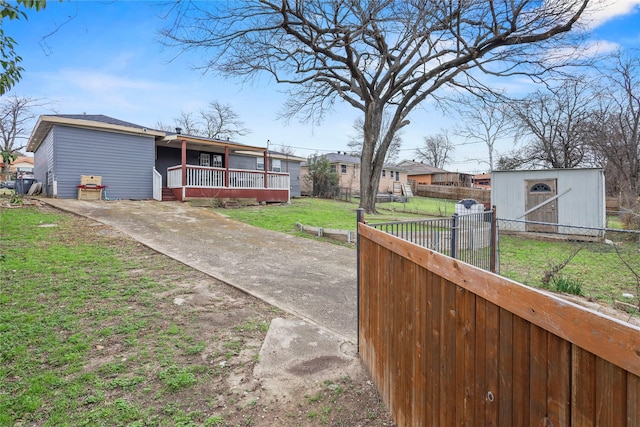 5621 Rocky Ridge Rd, Dallas, TX 75241 - exterior space with an outbuilding, a shed, a yard, and fence