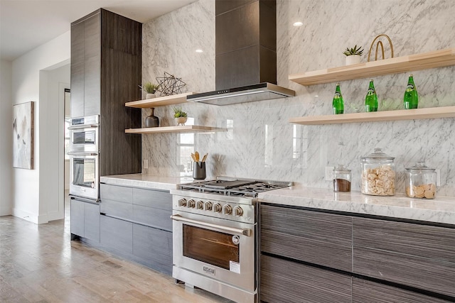 kitchen featuring tasteful backsplash, appliances with stainless steel finishes, modern cabinets, wall chimney exhaust hood, and open shelves