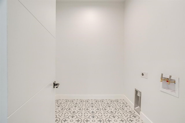 washroom with baseboards, hookup for an electric dryer, laundry area, light tile patterned flooring, and washer hookup