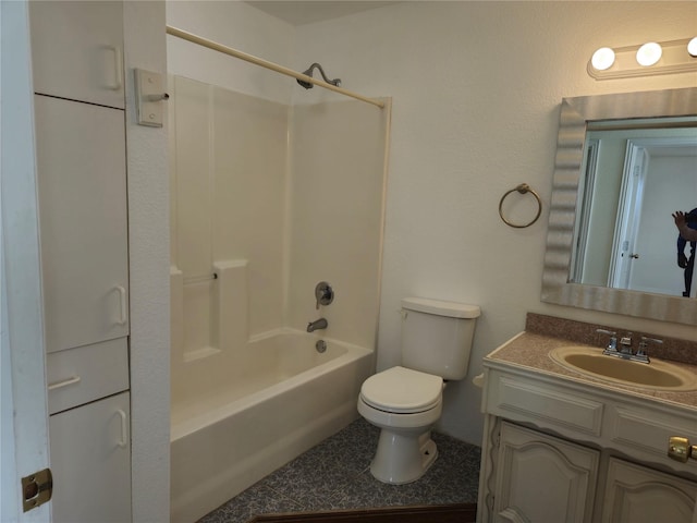 full bathroom with toilet, vanity, and bathtub / shower combination