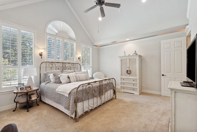 bedroom with baseboards, light carpet, high vaulted ceiling, and a ceiling fan