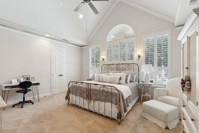 carpeted bedroom featuring ceiling fan, baseboards, visible vents, and high vaulted ceiling