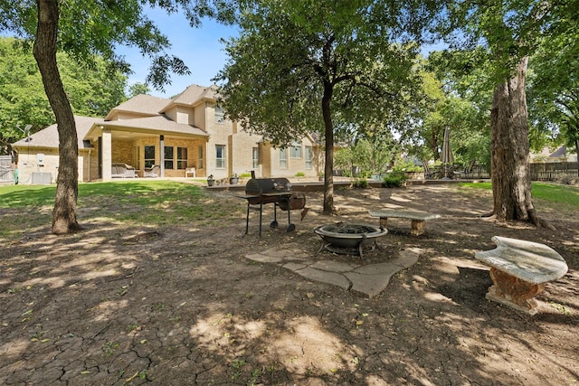 view of yard featuring a patio and fence