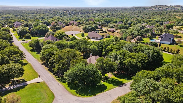 aerial view with a wooded view