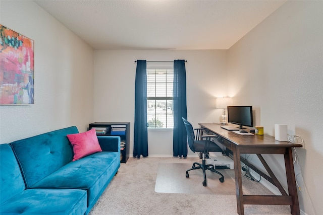 carpeted office with baseboards