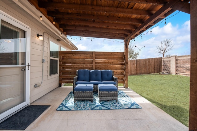 view of patio / terrace featuring an outdoor living space and a fenced backyard