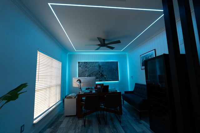 office space featuring ceiling fan, wood finished floors, and ornamental molding