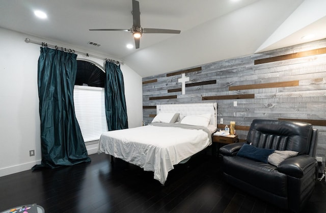 bedroom featuring vaulted ceiling, recessed lighting, and wood finished floors