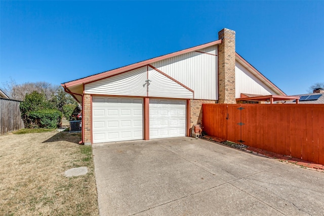 garage with fence