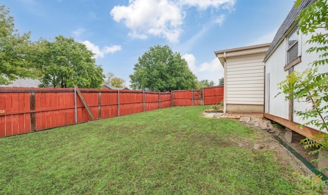 view of yard featuring a fenced backyard