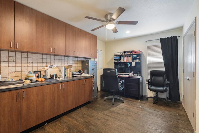 office space with dark wood-type flooring and a ceiling fan