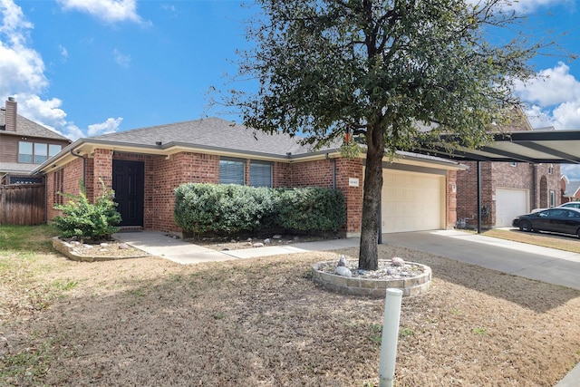 ranch-style home featuring driveway, fence, roof with shingles, a garage, and brick siding