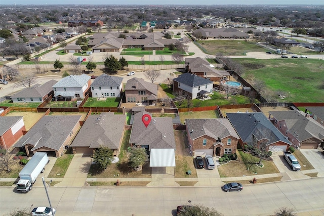 birds eye view of property with a residential view