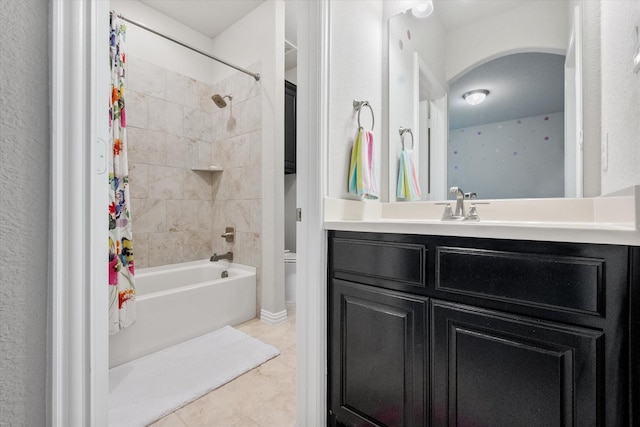 full bath featuring tile patterned floors, toilet, shower / bath combo, and vanity