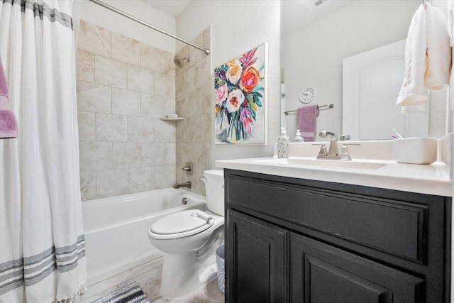 bathroom with visible vents, vanity, toilet, and shower / tub combo