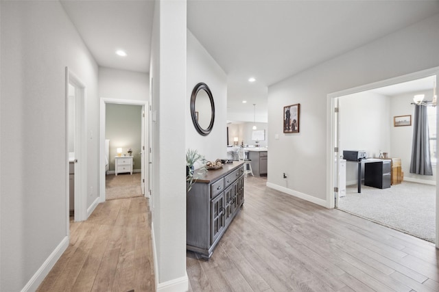 16032 Bronte Ln, Fort Worth, TX 76247 - corridor with baseboards, recessed lighting, a chandelier, and light wood-style floors
