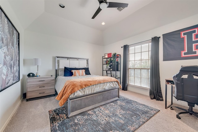 carpeted bedroom with a ceiling fan, a tray ceiling, recessed lighting, and baseboards