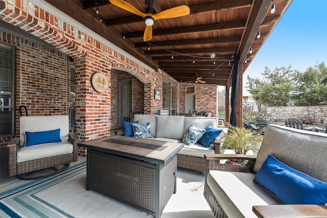 view of patio / terrace featuring an outdoor living space and ceiling fan