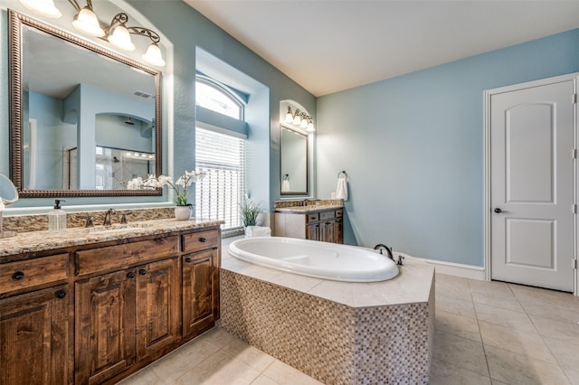 bathroom featuring visible vents, a sink, walk in shower, tile patterned floors, and a bath