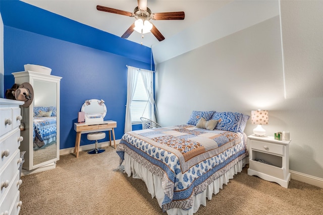 bedroom featuring light carpet, baseboards, and vaulted ceiling