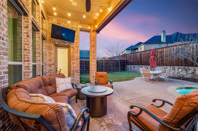 view of patio / terrace featuring an outdoor hangout area, outdoor dining area, and a fenced backyard
