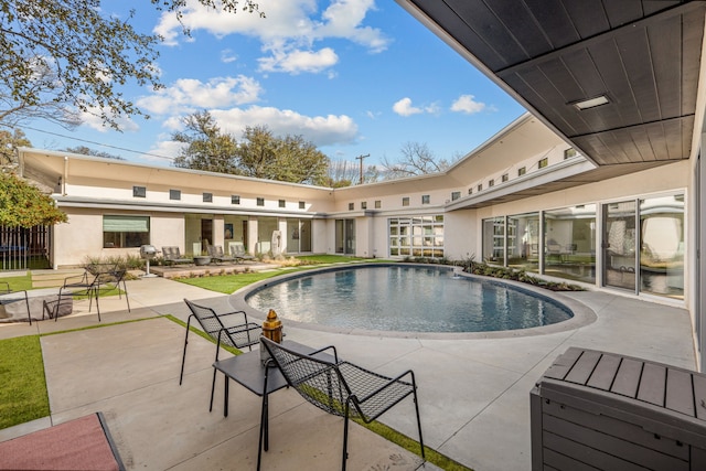 pool featuring a patio