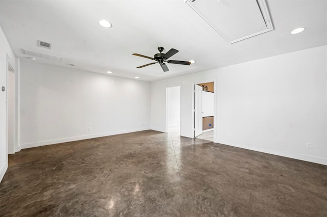 empty room featuring visible vents, attic access, recessed lighting, ceiling fan, and concrete flooring