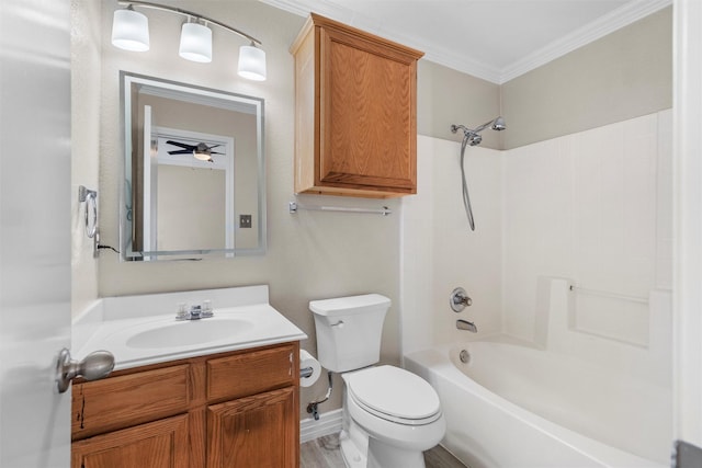 bathroom with vanity, toilet, crown molding, and bathtub / shower combination