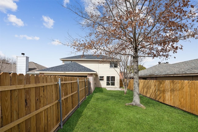 view of yard featuring a fenced backyard