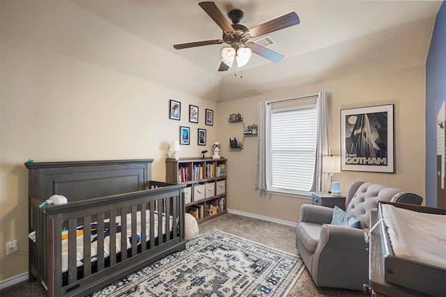 bedroom featuring baseboards, carpet, lofted ceiling, and a ceiling fan