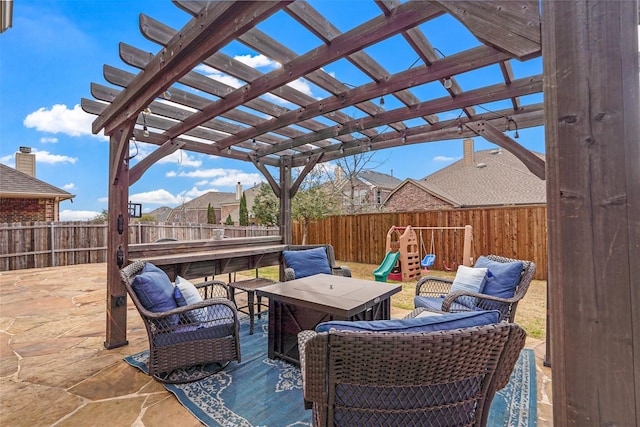 view of patio / terrace featuring a playground, a fenced backyard, a pergola, and an outdoor hangout area