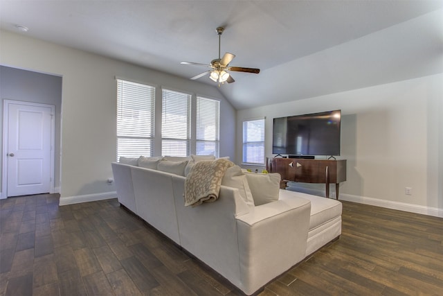 living area featuring dark wood-style floors, ceiling fan, baseboards, and vaulted ceiling