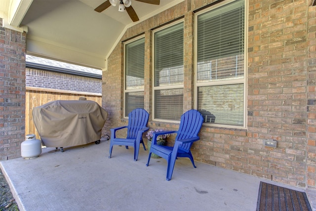 view of patio / terrace with grilling area and ceiling fan