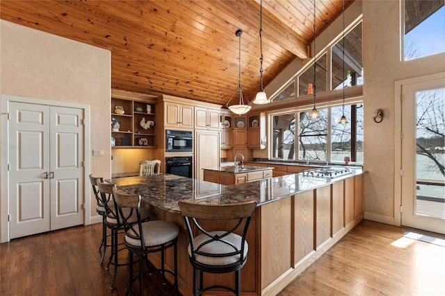 kitchen featuring wood finished floors, open shelves, a sink, wooden ceiling, and beamed ceiling