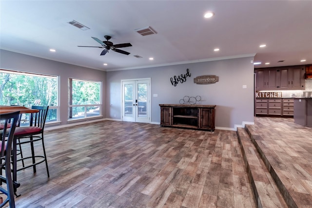 1809 Faulkner Dr, Rowlett, TX 75088 - living area with recessed lighting, ceiling fan, visible vents, and wood finished floors