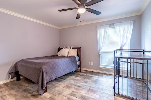 1809 Faulkner Dr, Rowlett, TX 75088 - bedroom featuring baseboards, ornamental molding, light wood-style flooring, and a ceiling fan