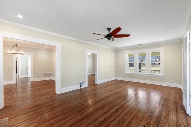 unfurnished living room with visible vents, baseboards, dark wood finished floors, and crown molding