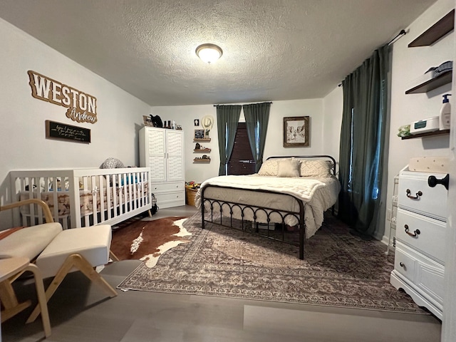 bedroom with a textured ceiling