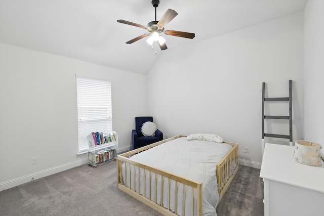 carpeted bedroom featuring a ceiling fan, baseboards, and vaulted ceiling