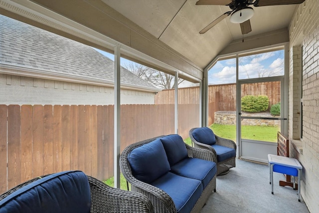 sunroom with vaulted ceiling and ceiling fan