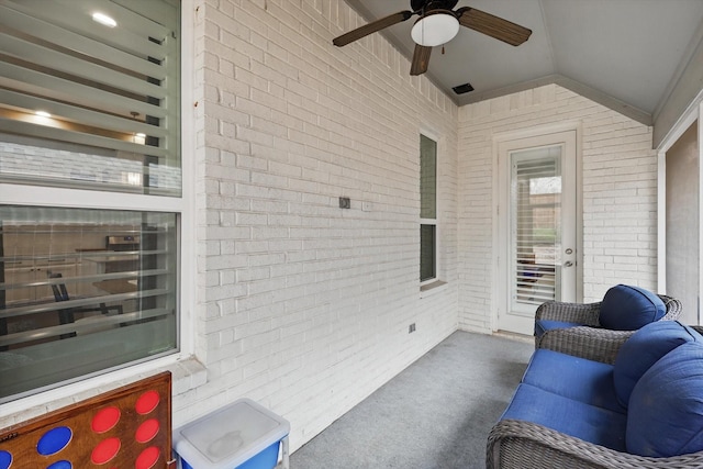 view of patio with ceiling fan