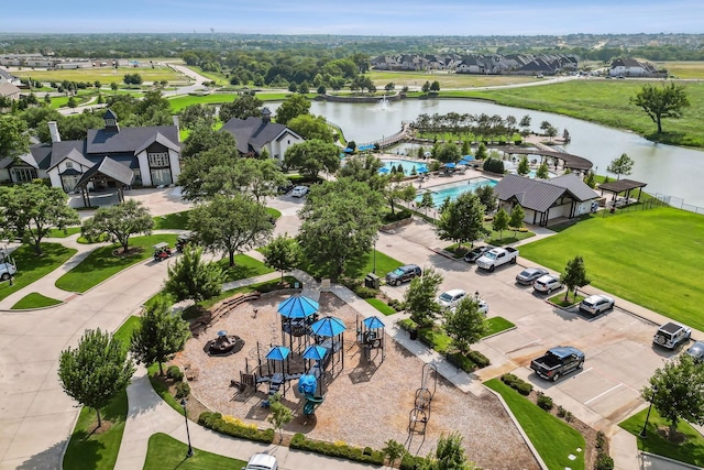 birds eye view of property featuring a water view